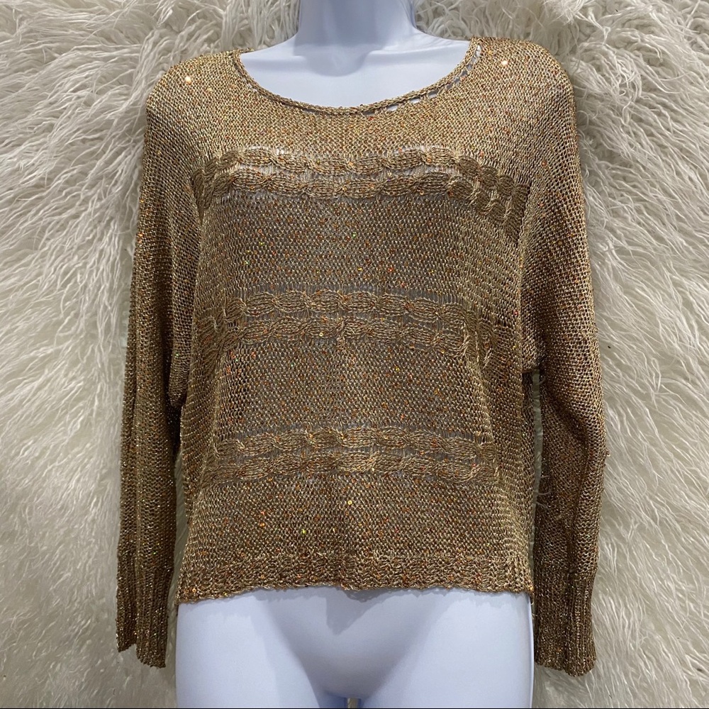 8. Gold Sweater